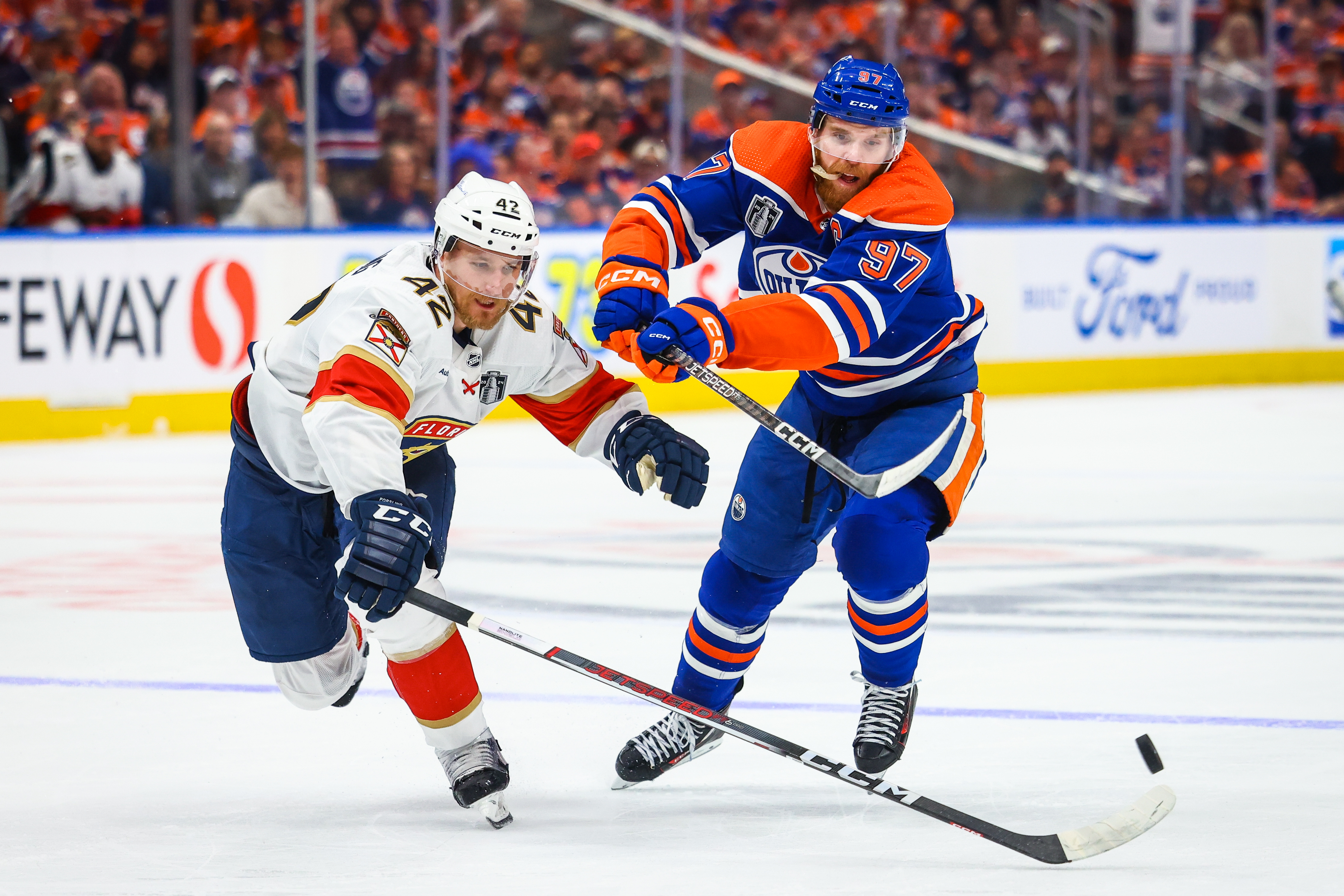 Florida Panthers defenseman Gustav Forsling and Edmonton Oilers center Connor McDavid battles for the puck as we analyze some of the best prop picks for Monday's Stanley Cup Final Game 7.