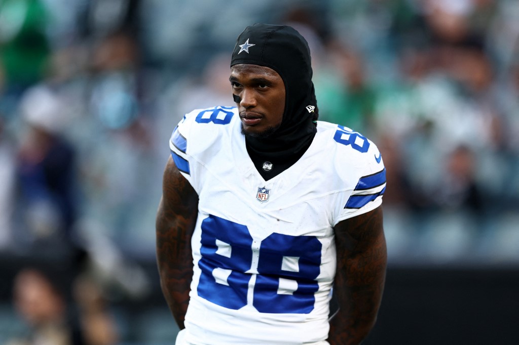 CeeDee Lamb of the Dallas Cowboys looks on prior to a game against the Philadelphia Eagles at Lincoln Financial Field as we look at our best NFL Thanksgiving Day prop picks.